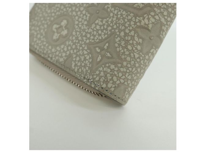 Cartera Vertical Zippy Taurillon Climbing Louis Vuitton Marfil M81573 Auth 172432SAM Crudo - vista 16