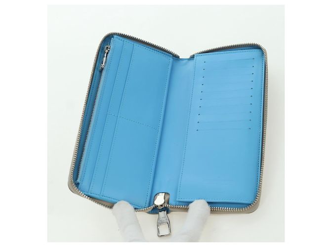 Cartera Vertical Zippy Taurillon Climbing Louis Vuitton Marfil M81573 Auth 172432SAM Crudo - vista 18