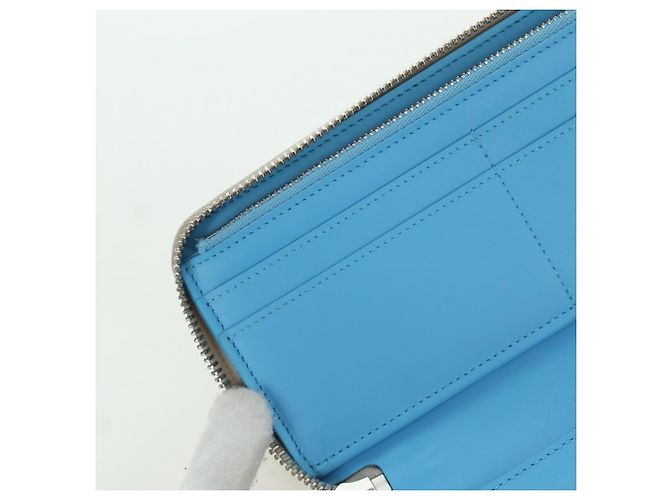 Cartera Vertical Zippy Taurillon Climbing Louis Vuitton Marfil M81573 Auth 172432SAM Crudo - vista 19