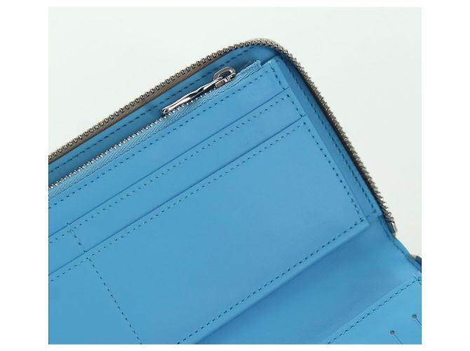 Cartera Vertical Zippy Taurillon Climbing Louis Vuitton Marfil M81573 Auth 172432SAM Crudo - vista 20