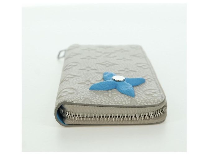 Cartera Vertical Zippy Taurillon Climbing Louis Vuitton Marfil M81573 Auth 172432SAM Crudo - vista 5