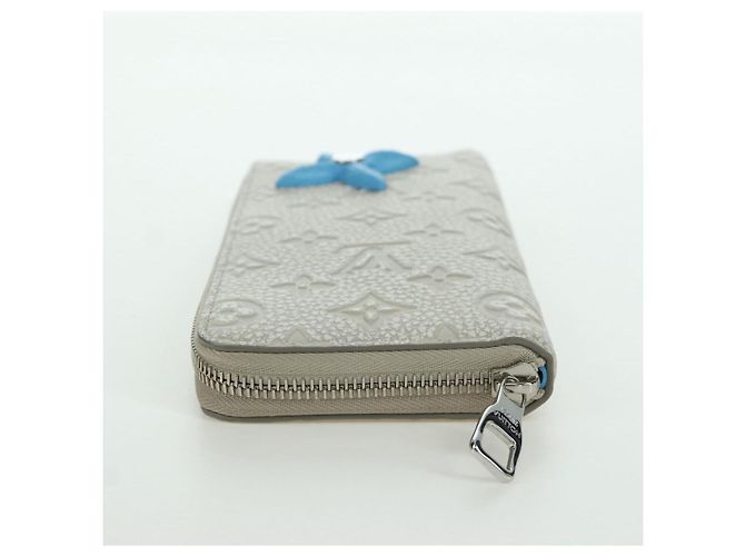 Cartera Vertical Zippy Taurillon Climbing Louis Vuitton Marfil M81573 Auth 172432SAM Crudo - vista 6