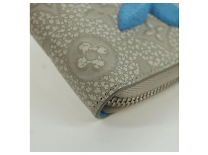 Cartera Vertical Zippy Taurillon Climbing Louis Vuitton Marfil M81573 Auth 172432SAM Crudo - vista 7