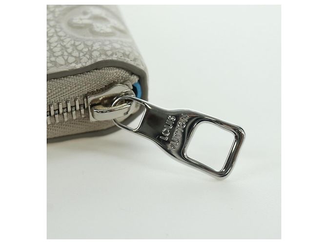 Cartera Vertical Zippy Taurillon Climbing Louis Vuitton Marfil M81573 Auth 172432SAM Crudo - vista 8