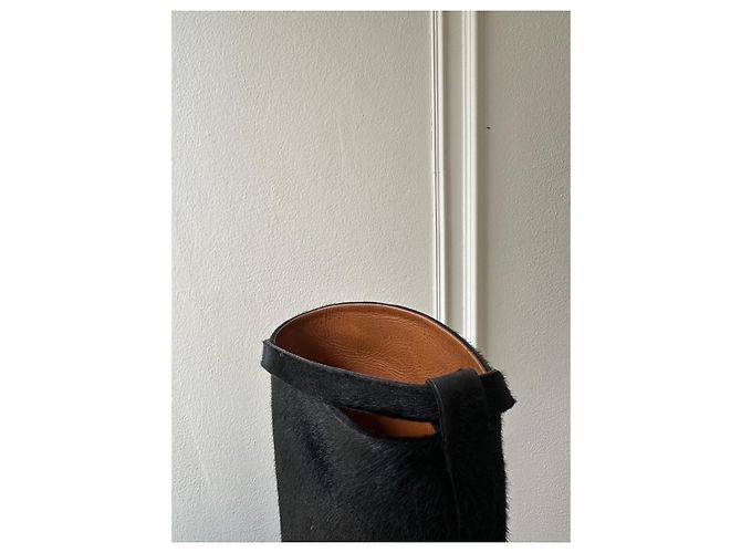 Botas altas de pelo de pony negro Hermès con herrajes de paladio - vista 7