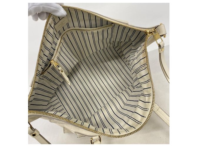 Borsa Tote Lumineuse PM in Monogram Empreinte Louis Vuitton Bianco - vista 4