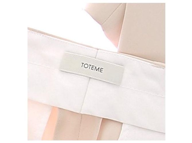 Totême Calça creme satinada Bege - vista 5