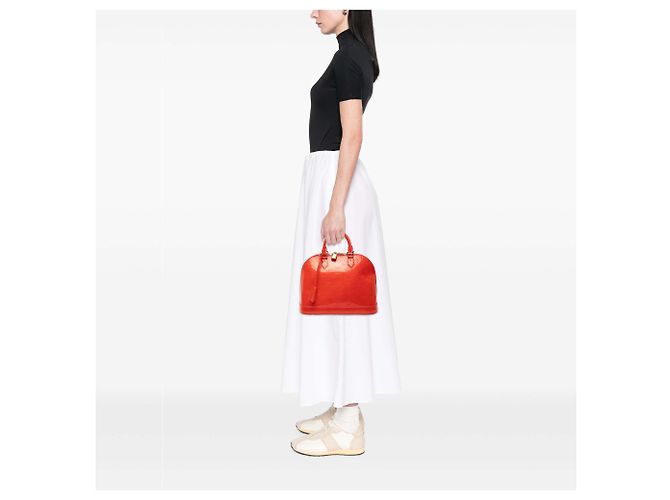 Louis Vuitton Alma PM in Vernis Monogram Arancione - vista 7