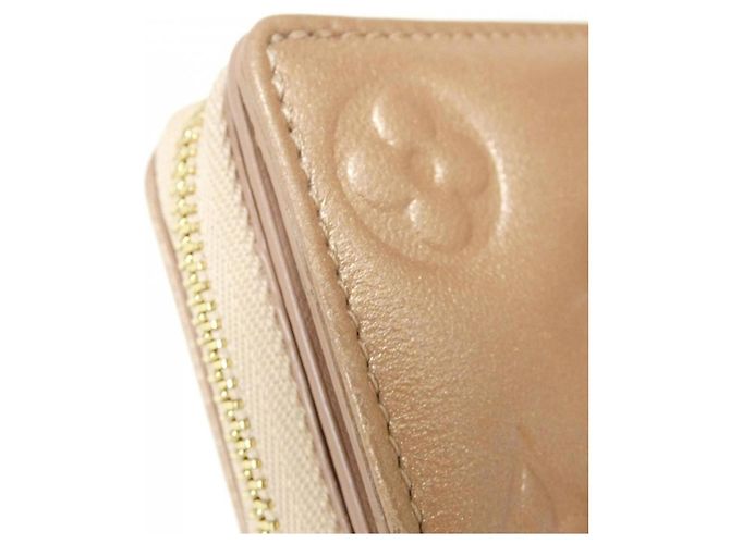Cartera Lou Coussin Louis Vuitton Camello - vista 3