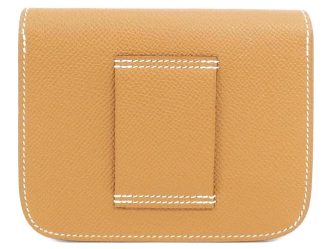 Hermès Billetera Slim Constance Hermes Dorado - vista 2