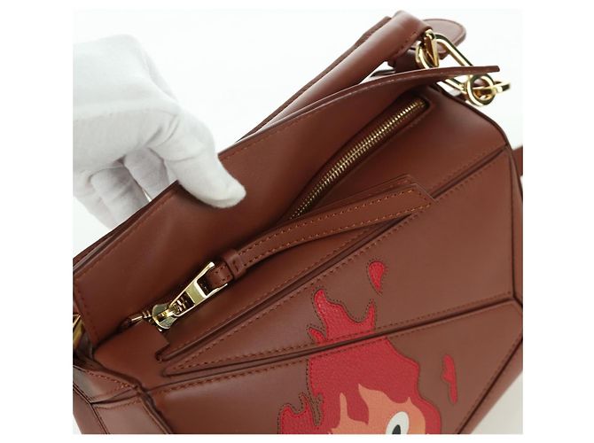 LOEWE - Puzzle Piccolo Calcifer in Pelle Ghibli Castello Errante 2way 167069SM Marrone D'oro - vista 18