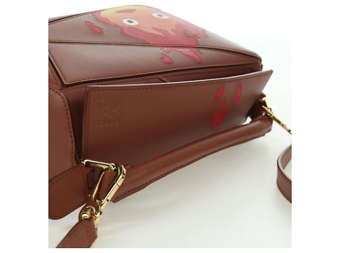 LOEWE - Puzzle Piccolo Calcifer in Pelle Ghibli Castello Errante 2way 167069SM Marrone D'oro - vista 6