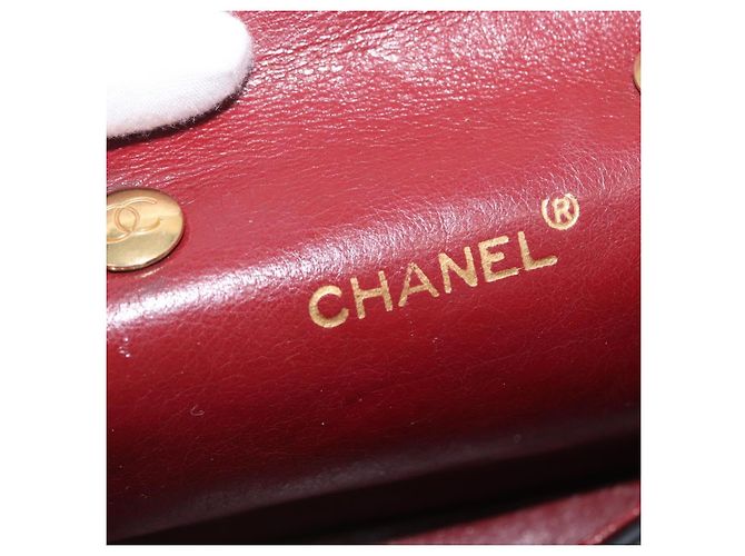 CHANEL Bolsa de Ombro Matelassé em Couro de Cordeiro Preto Ouro CC Auth 172545SAV Dourado - vista 22