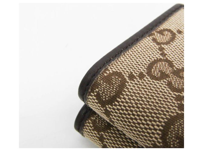 Portafoglio tri-fold da donna Gucci in tela GG e pelle Marrone Beige - vista 9