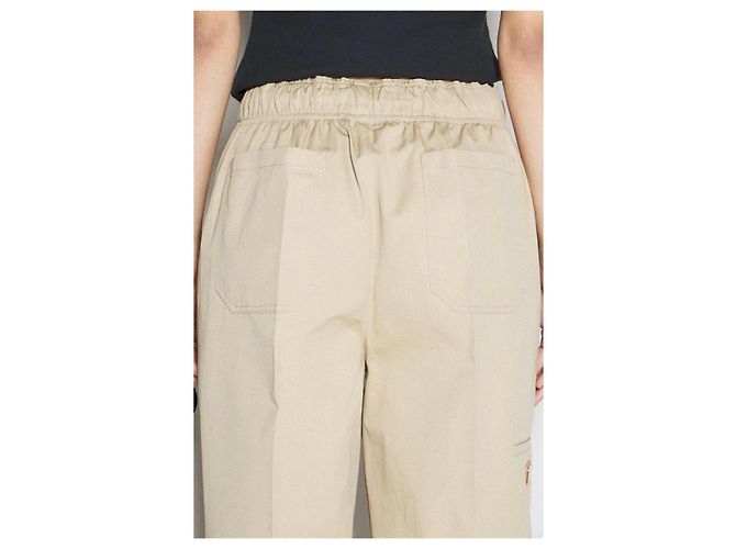 Calça larga de algodão bege com placa de logo Prada - vista 13