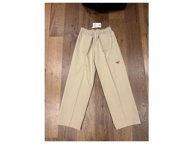 Calça larga de algodão bege com placa de logo Prada - vista 9