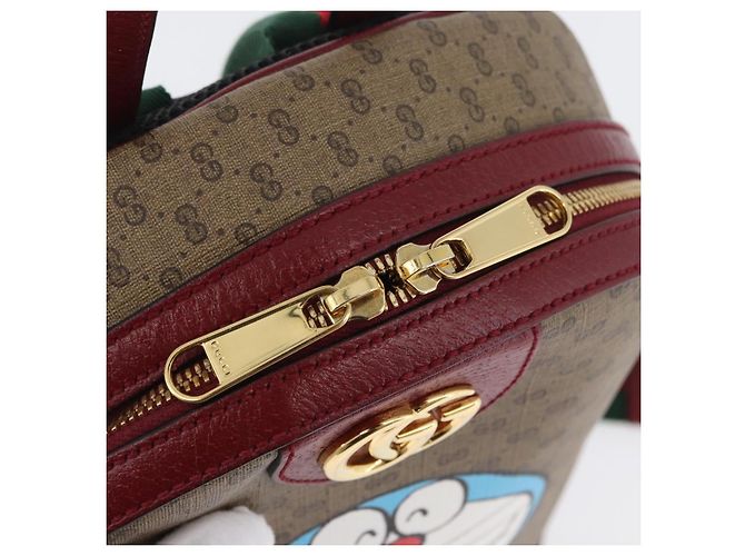 Gucci Zaino Doraemon Micro GG Supreme in PVC beige e oro 647816 Auth LNZ825SAM D'oro - vista 17