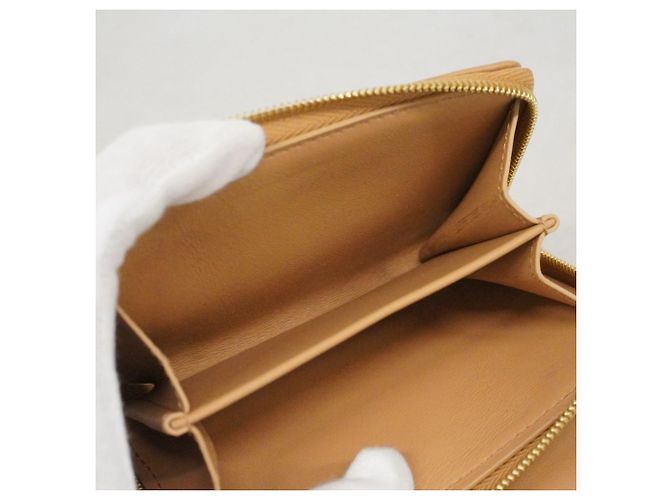 Coussin Cartera Lou de cuero Monogram grabado Louis Vuitton Camello - vista 9