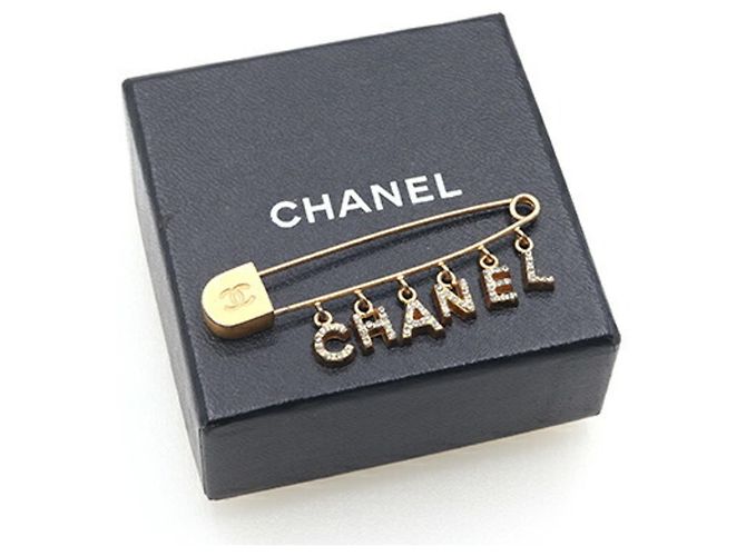 Spilla in metallo dorato con strass Chanel - vista 7