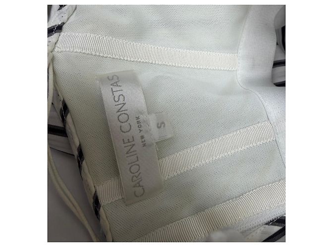 Autre Marque Blusa de rayas off-shoulder en algodón negro y blanco de Caroline Constas - vista 4