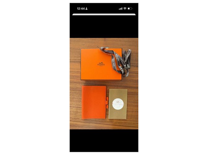 Capa de agenda de couro laranja Hermès com inserts de mapa-múndi - vista 2