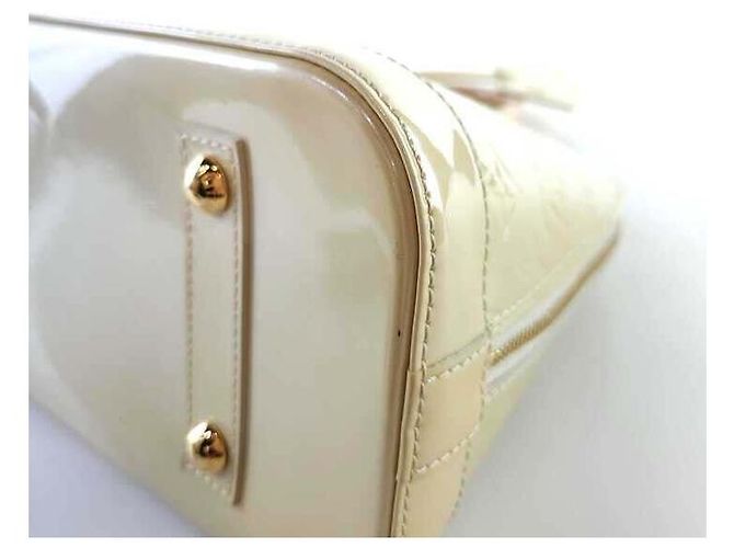 Louis Vuitton Borsa Alma PM in Monogram Vernis D'oro - vista 5