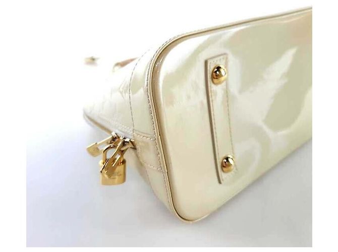 Louis Vuitton Borsa Alma PM in Monogram Vernis D'oro - vista 6