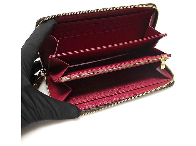 Louis Vuitton Langer Zippy Geldbeutel aus Monogramm-Canvas in Fuchsia Pink - Ansicht 6