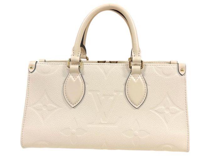 Borsa a Spalla OnTheGo EW Monogram Empreinte Louis Vuitton Beige - vista 4