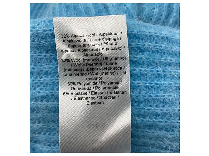 Feinstrick-Pullover aus hellblauer Wolle mit Ausschnitten von Ganni - Ansicht 5