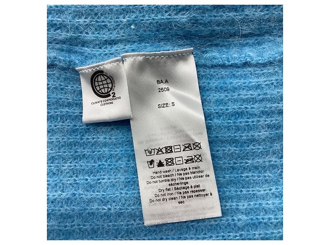Feinstrick-Pullover aus hellblauer Wolle mit Ausschnitten von Ganni - Ansicht 6