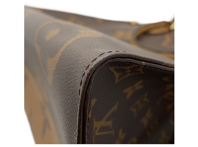 Borsa Tote OnTheGo GM Monogram Reverse Gigante Louis Vuitton Rosso - vista 10