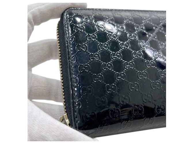 Carteira longa redonda Gucci em couro patente preto - vista 10