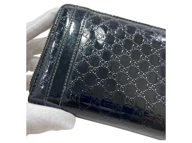 Carteira longa redonda Gucci em couro patente preto - vista 11