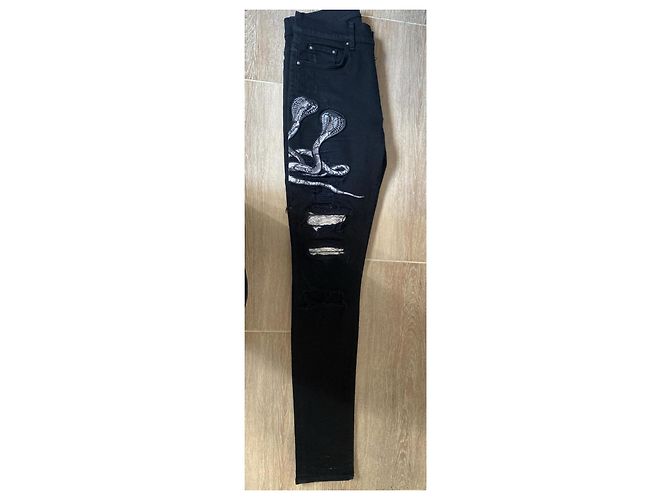 Jeans Amiri neri con serpenti e strappi Nero - vista 3