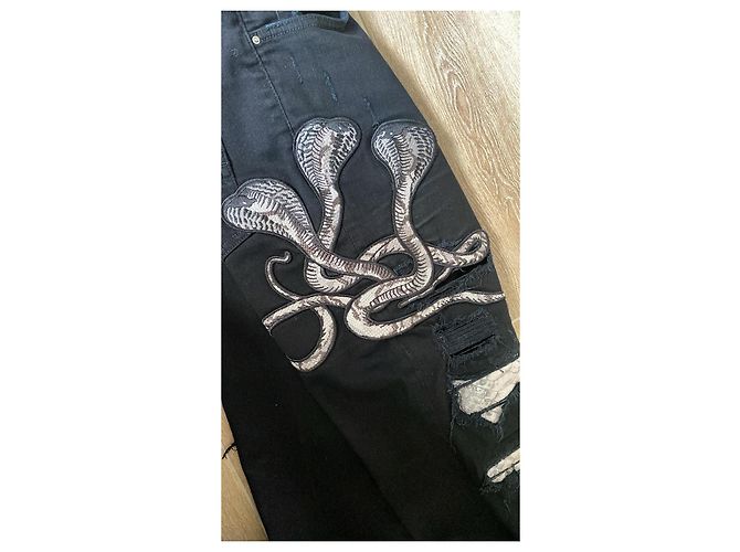 Jeans Amiri neri con serpenti e strappi Nero - vista 4