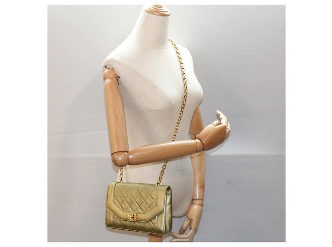 CHANEL Borsa a Spalla con Catena Matelassé e Chiusura a Girello in Pelle di Agnello Oro CC Auth 51274SAM D'oro - vista 25
