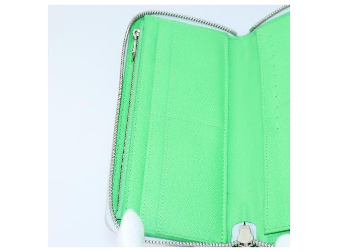 LOUIS VUITTON Monogram LV Portrait Zippy Vertical Wallet M82590 LV Auth 92757SAM White - view 17