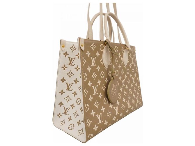 Borsa tote OnTheGo MM in Monogram Empreinte Louis Vuitton Beige Cachi - vista 2