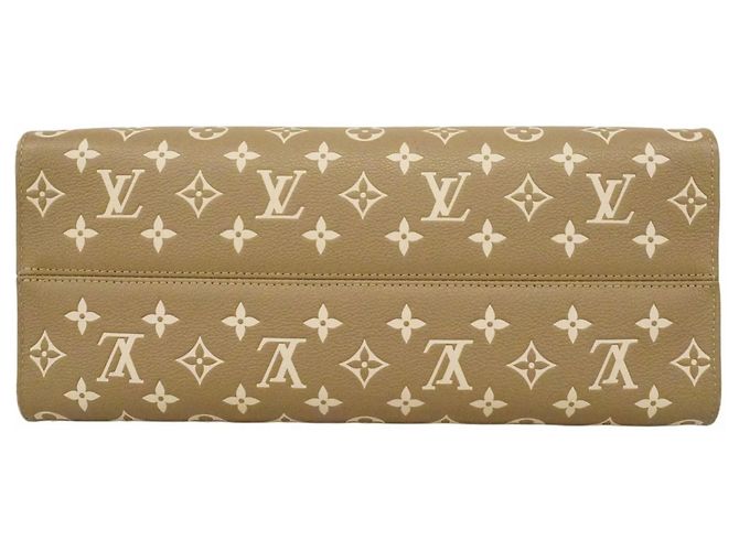 Borsa tote OnTheGo MM in Monogram Empreinte Louis Vuitton Beige Cachi - vista 3