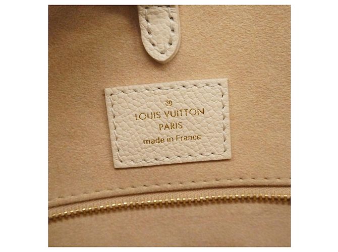 Borsa tote OnTheGo MM in Monogram Empreinte Louis Vuitton Beige Cachi - vista 5
