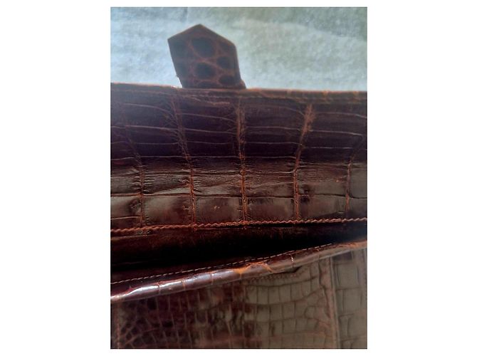 Portefeuille Hermès en cuir de crocodile porosus marron - vue 7