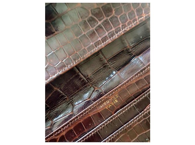 Portefeuille Hermès en cuir de crocodile porosus marron - vue 9