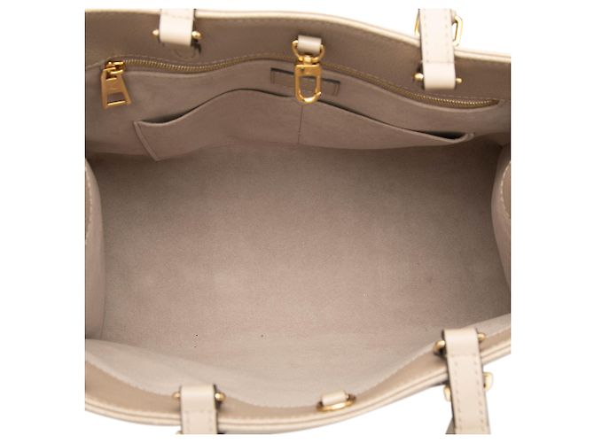 Louis Vuitton Monogram Empreinte Beige OnTheGo MM - vista 4
