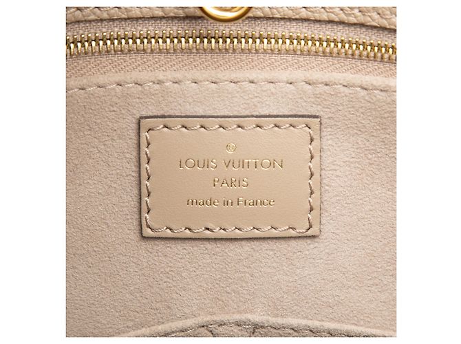 Louis Vuitton Monogram Empreinte Beige OnTheGo MM - vista 5