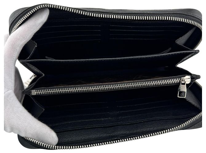 Zippy Clutch in pelle marrone Louis Vuitton - vista 11