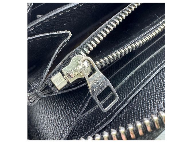 Zippy Clutch in pelle marrone Louis Vuitton - vista 15