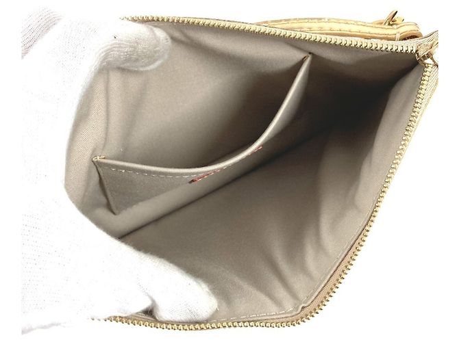 Pochette in pelle dorata Louis Vuitton D'oro - vista 3