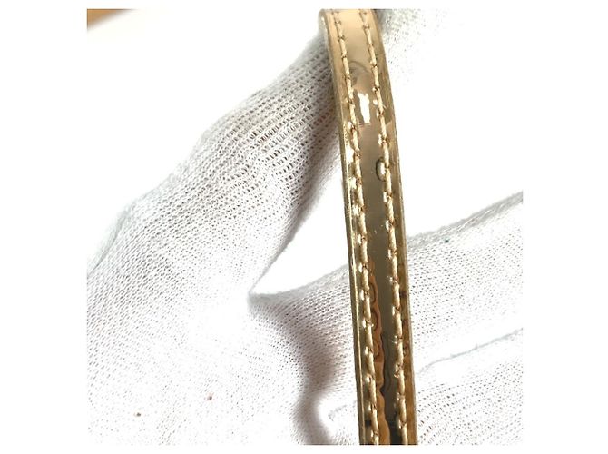 Pochette in pelle dorata Louis Vuitton D'oro - vista 7