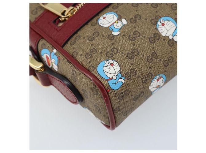 Gucci Borsa Doraemon Micro GG Supreme in PVC beige e oro 647784 Auth ka3475SAM D'oro - vista 11